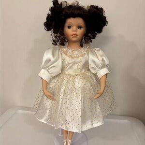 Charming White and Gold Doll with Curly Hair
